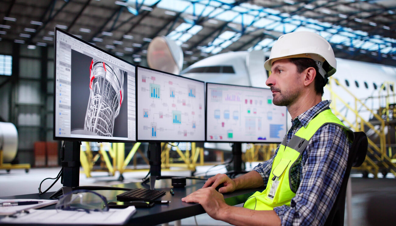 aircraft repair. technician checking plane jet engine